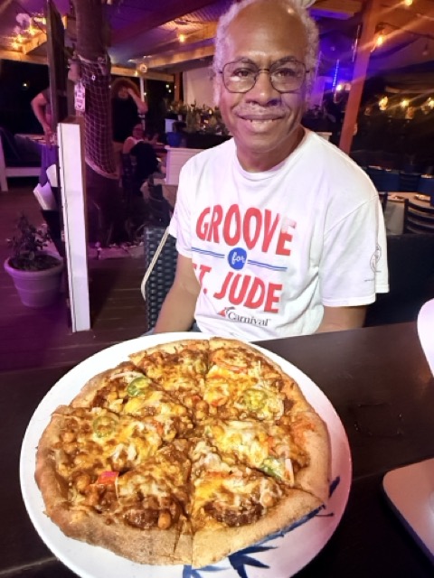 Happy guest enjoying food at Thali Indian Grill